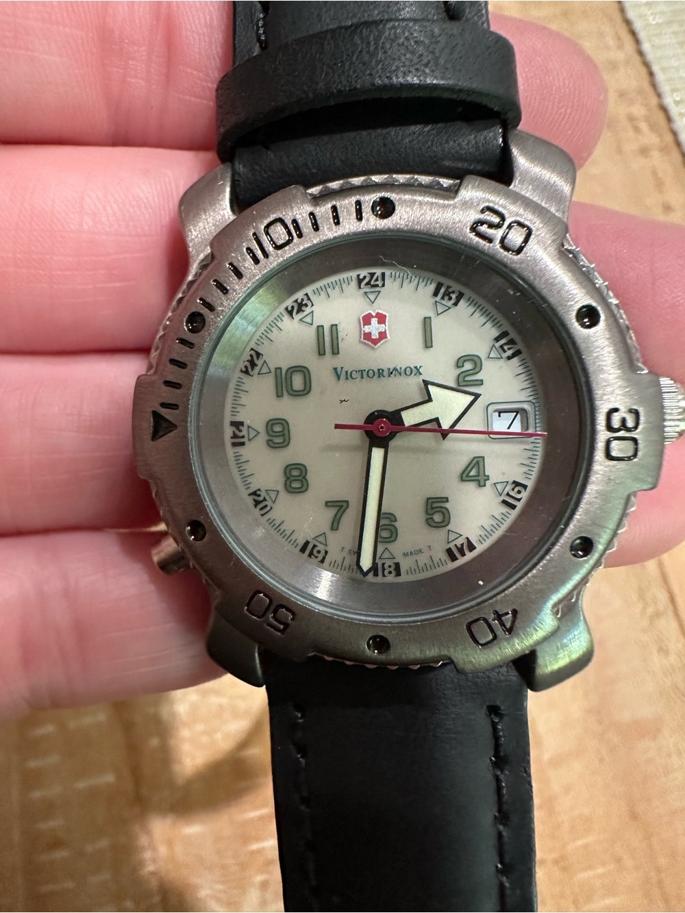 Victorinox Silver Case Watch with Black Leather Strap and Cream Dial